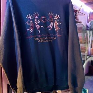 Vintage Blue Crewneck Sweater with Playful Design